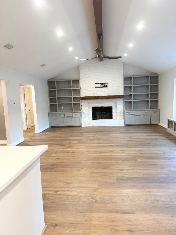 13610 Taylorcrest Road Houston, TX 77079 - Photo 6 of 22 an empty room with wooden floor and windows
