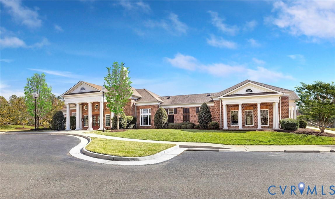 6454 Fennec Run Moseley, VA 23120 - Photo 17 of 23 a front view of a house with a yard
