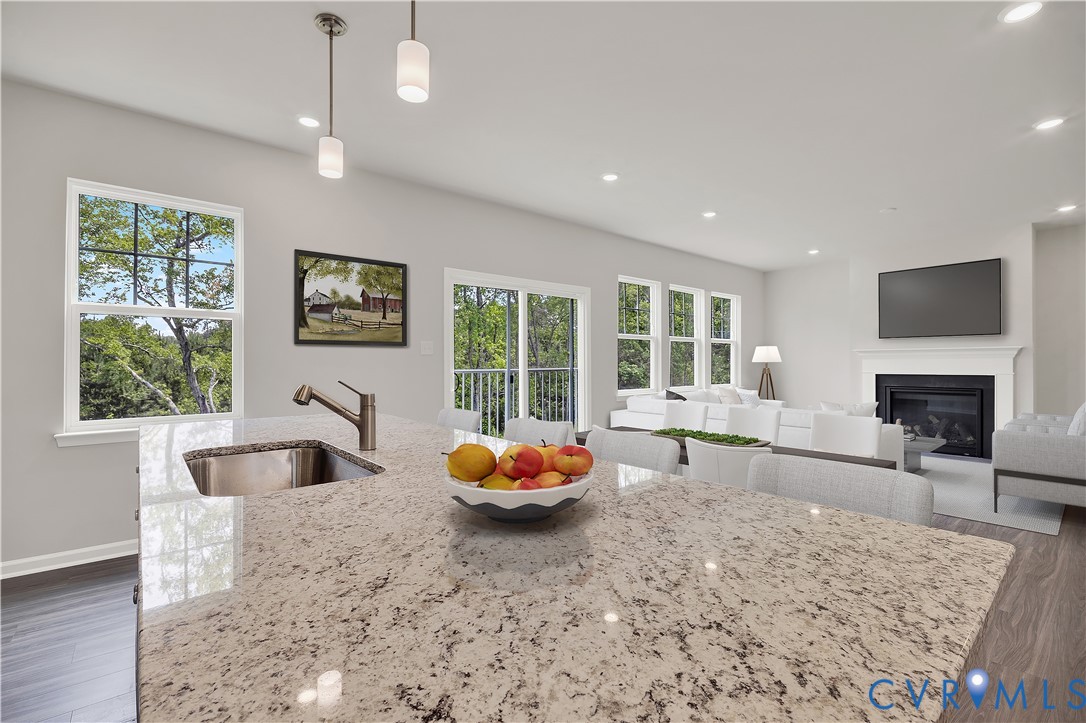 6454 Fennec Run Moseley, VA 23120 - Photo 6 of 23 a living room with furniture and a large window