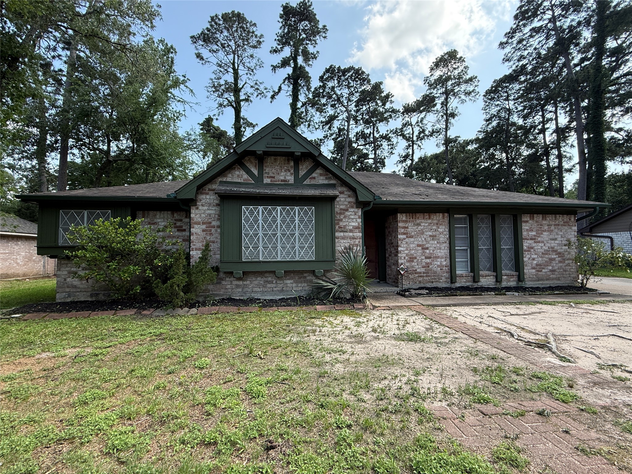 422 Gamewood Drive Spring, TX 77386 - Photo 1 of 25 a front view of a house with garden