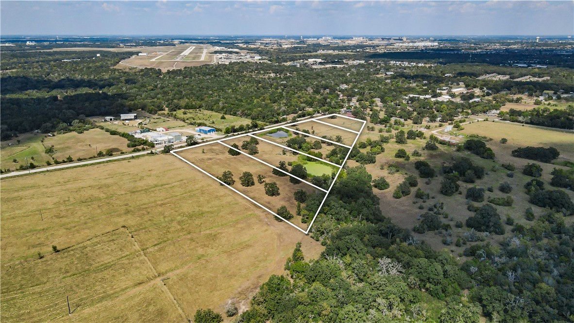 5 Hopes Creek Road College Station, TX 77845 - Photo 6 of 6 a view of a lake with a mountain