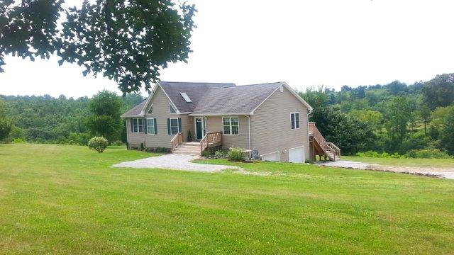 1681 Blankenship Road Goodview, VA 24095 - Photo 23 of 23 a view of a house with a yard and sitting area