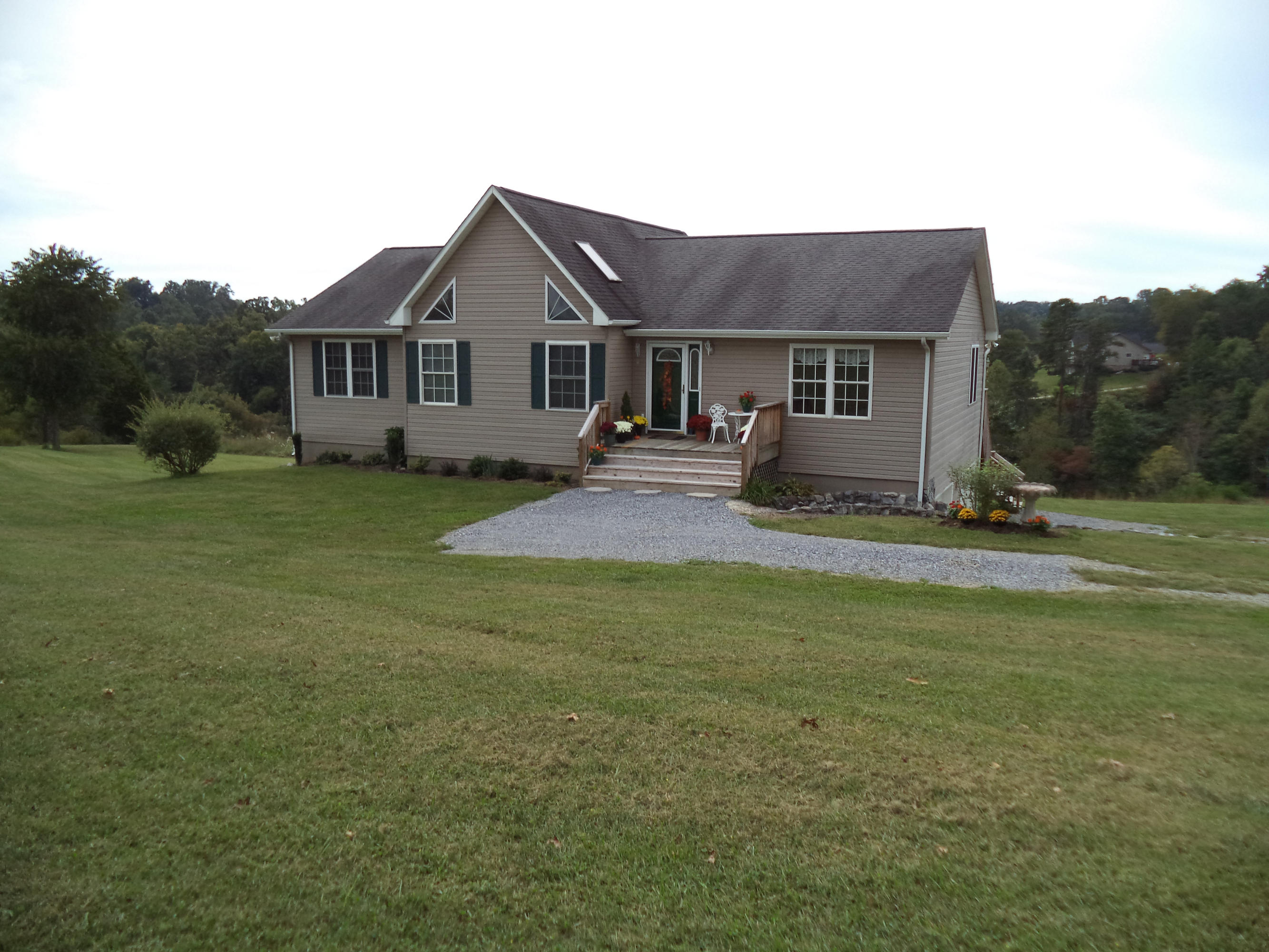 1681 Blankenship Road Goodview, VA 24095 - Photo 7 of 23 a front view of a house with a yard