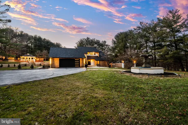 a view of a house with a big yard