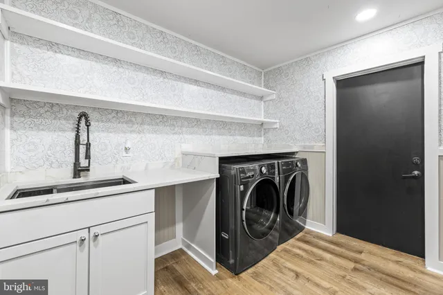 an empty room with white walls and white walls