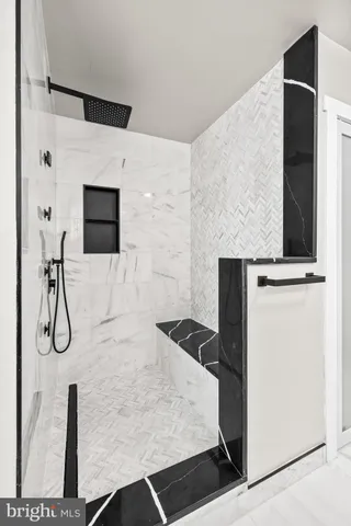 an empty room with white walls and white walls