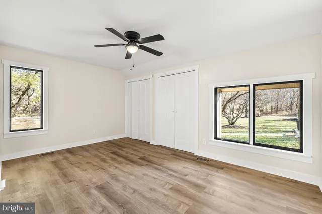 a view of an empty room with a sink
