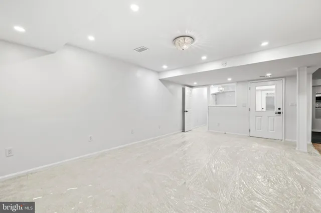 a view of a backyard with a patio