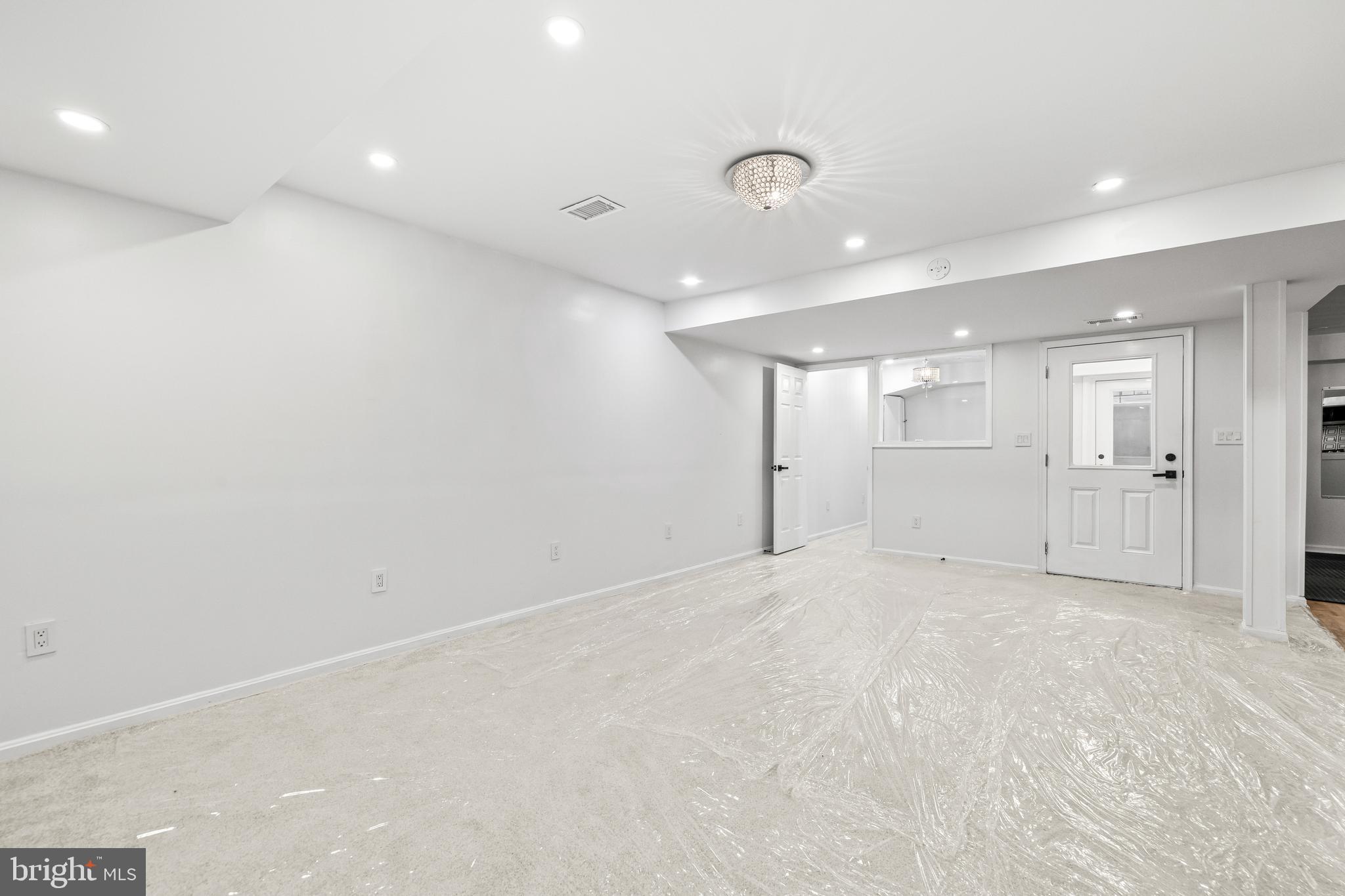 12206 Cleghorn Road Cockeysville, MD 21030 - Photo 44 of 84 an empty room with white walls and white walls