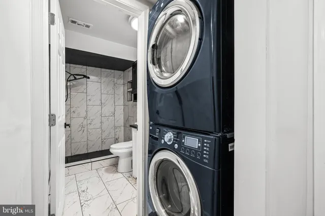 a view of a backyard with large trees