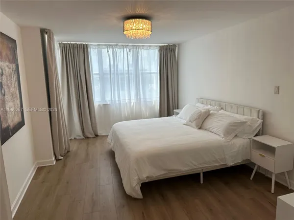 a kitchen with granite countertop cabinets and steel stainless steel appliances