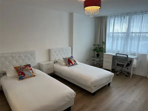 a view of city with tall buildings