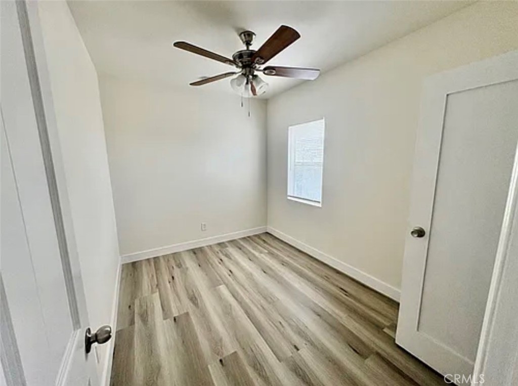 549 East 17th Street, Unit 551 Long Beach, CA 90813 - Photo 12 of 18 wooden floor in an empty room
