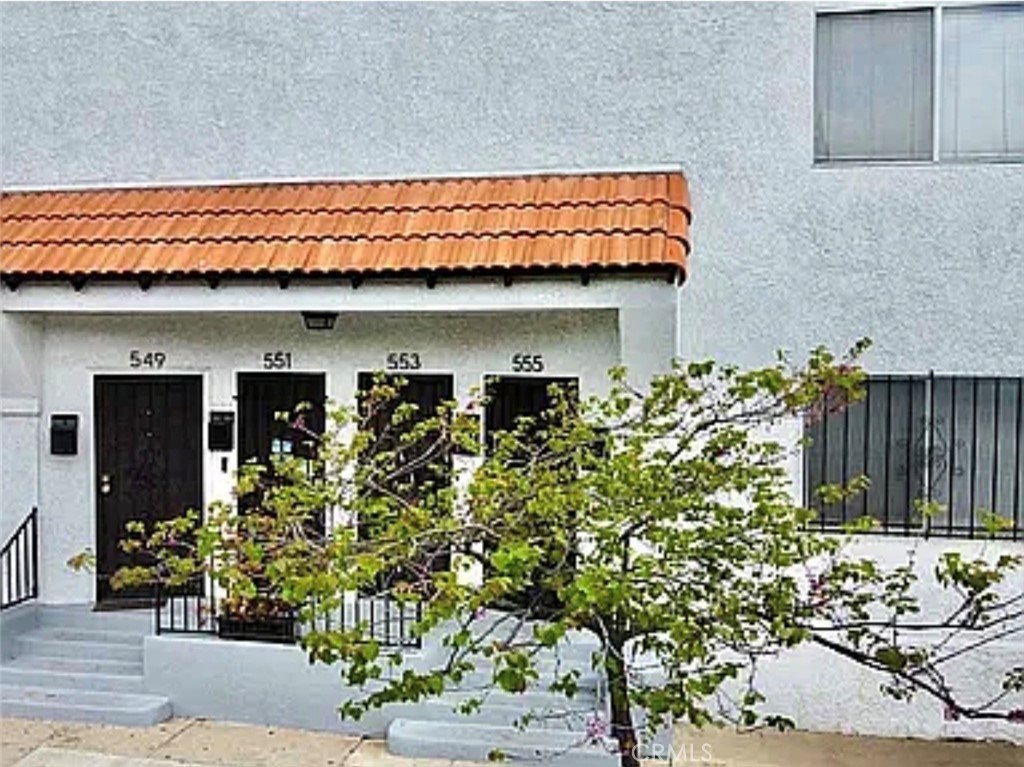 549 East 17th Street, Unit 551 Long Beach, CA 90813 - Photo 16 of 18 a front view of a house