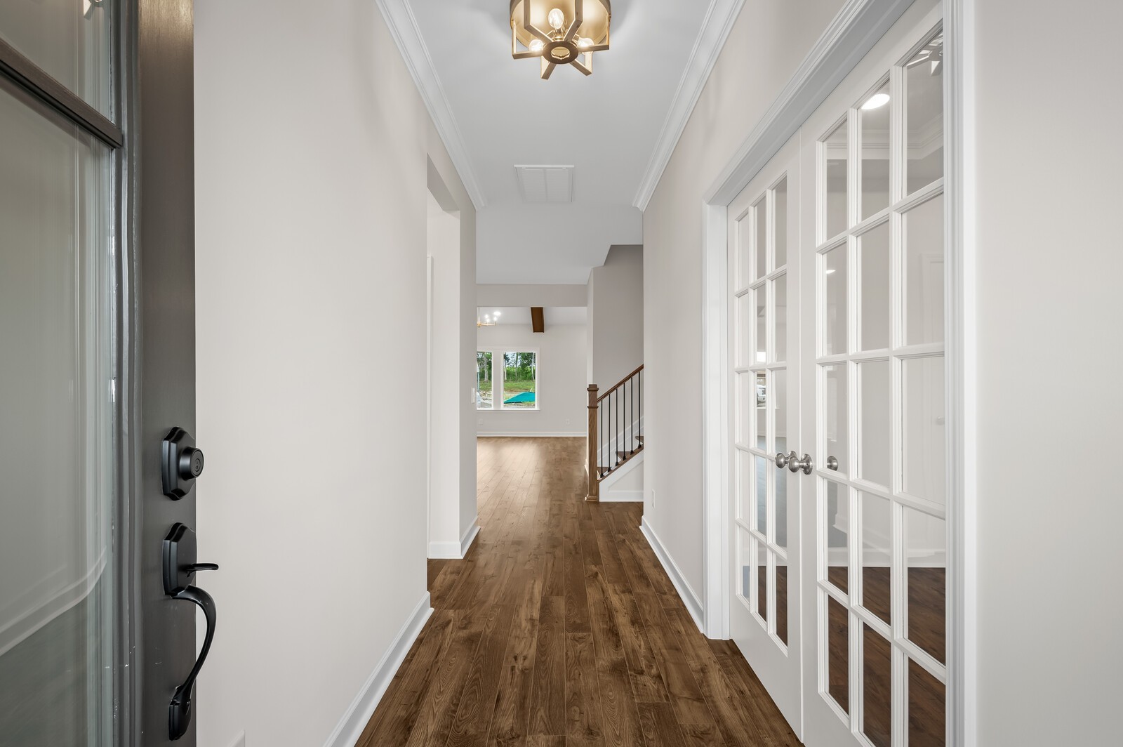 1733 Merkel Road Columbia, TN 38401 - Photo 7 of 53 a view of a hallway with wooden floor and staircase