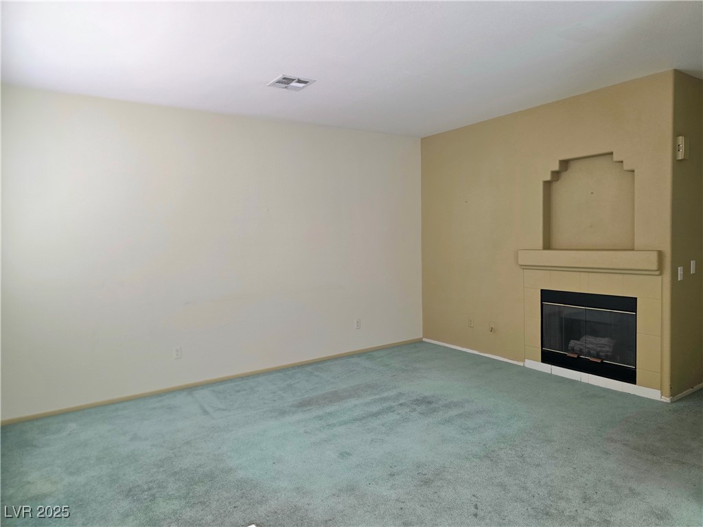 1851 Hillpointe Road, Unit 1023 Henderson, NV 89074 - Photo 7 of 15 Living room with fireplace