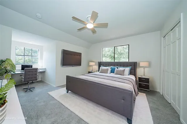 a bathroom with a double vanity sink and mirror
