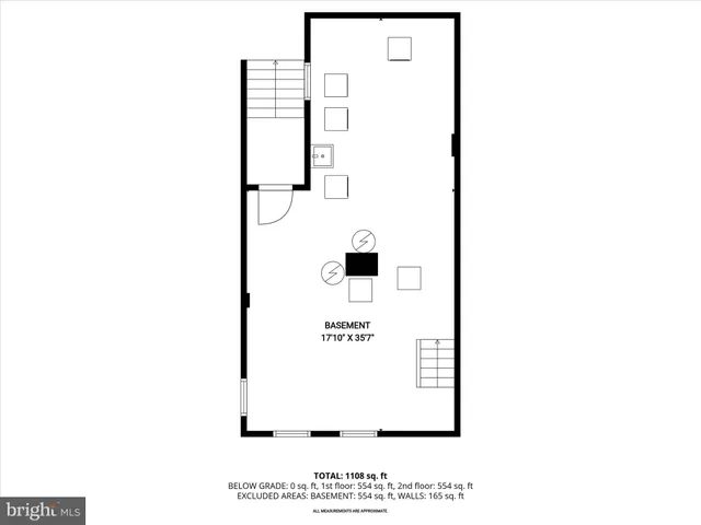 a picture of a bench in front of a wall