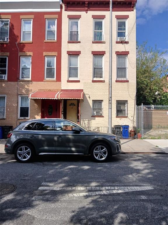 10 Monaco Place Brooklyn, NY 11233 - Photo 1 of 2 a car parked in front of a house