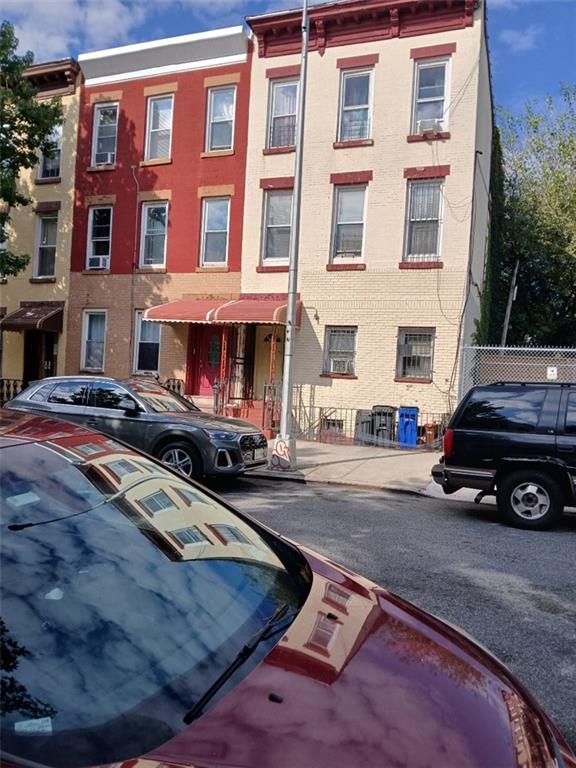 10 Monaco Place Brooklyn, NY 11233 - Photo 2 of 2 a view of a car parked in front of a building