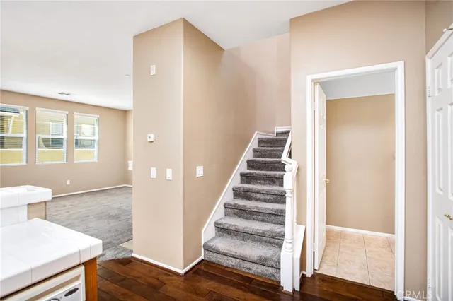 a view of storage and utility room with a fireplace