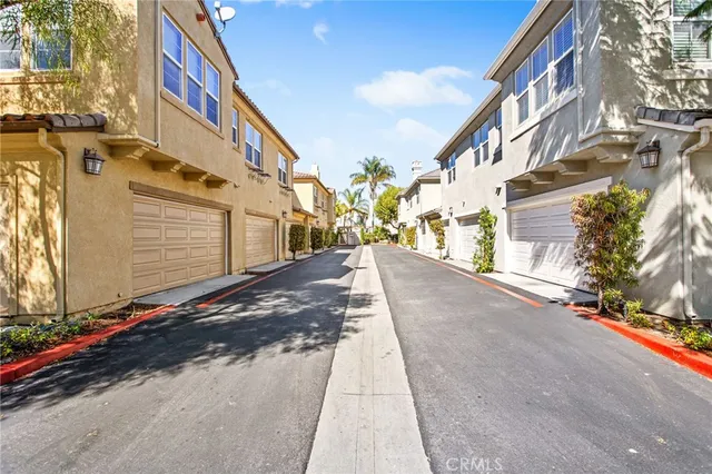 swimming pool view with a seating space