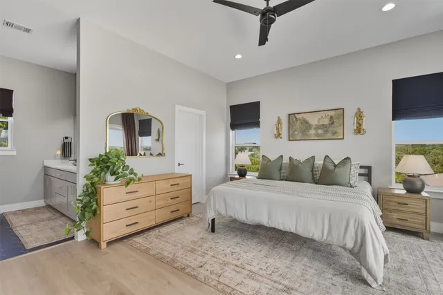 a bedroom with a bed and a dresser