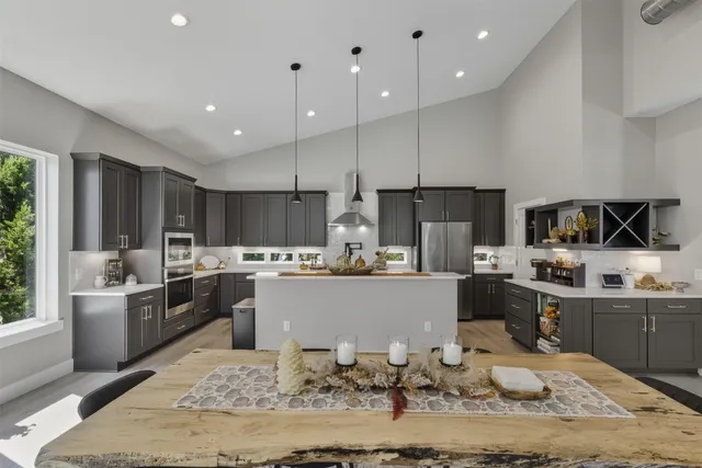 a kitchen with counter top space appliances and cabinets
