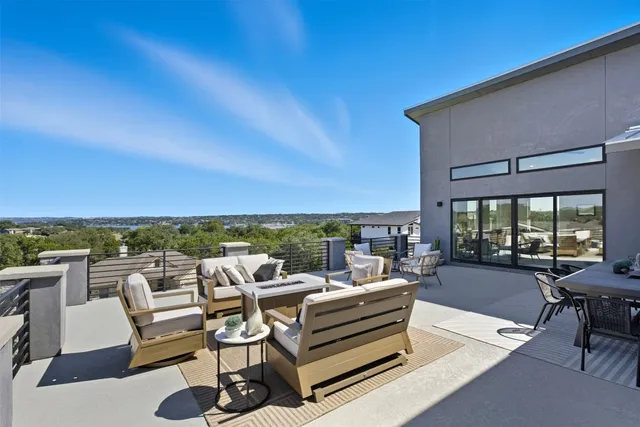 a view of a terrace with furniture