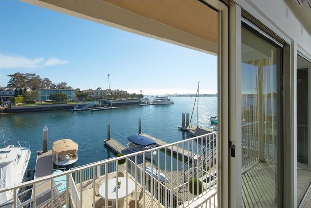 a view of a balcony with an ocean