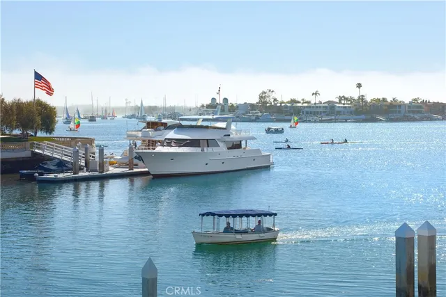 a view of balcony with two chairs and a wooden floor