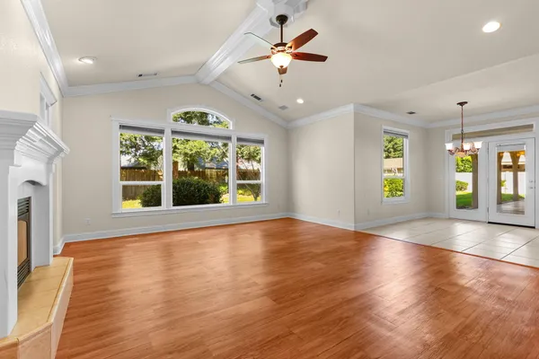 a view of a dining room with furniture window and outside view