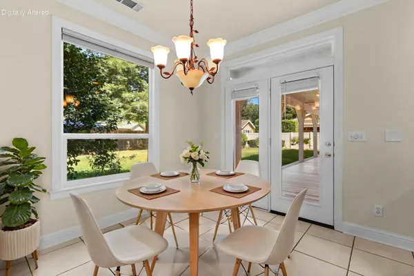 an empty room with windows and outdoor view