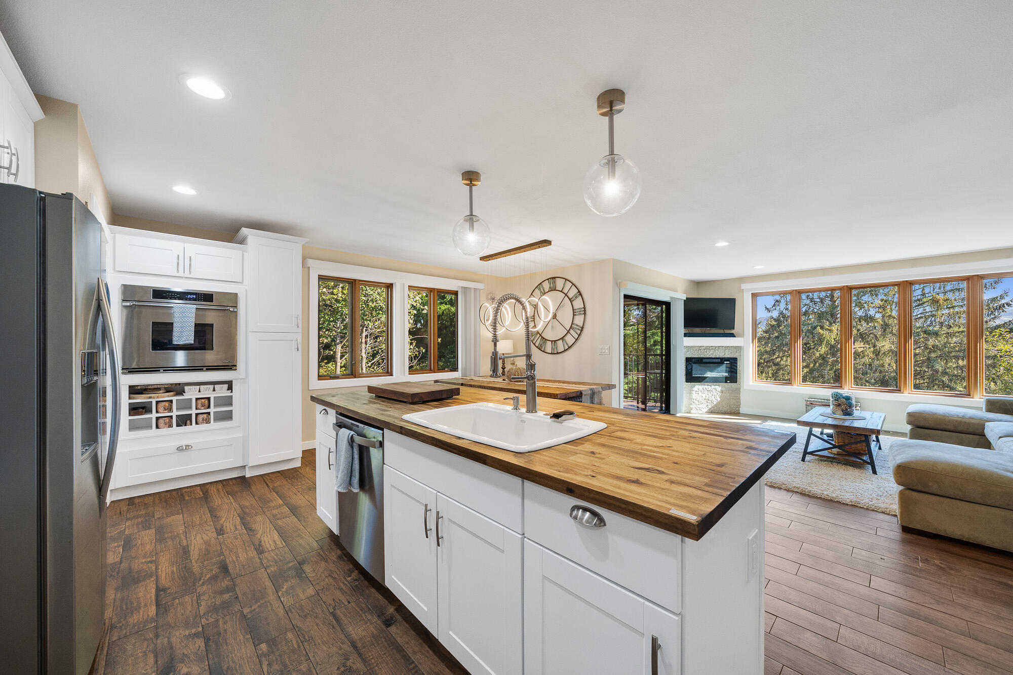 13150 D Street Nehalem, OR 97131 - Photo 7 of 29 a open kitchen with stainless steel appliances granite countertop a stove and refrigerator