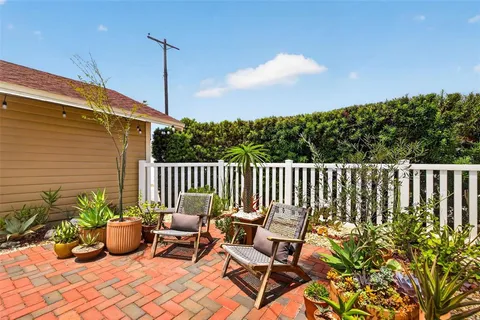 a wooden bench sitting in roof deck