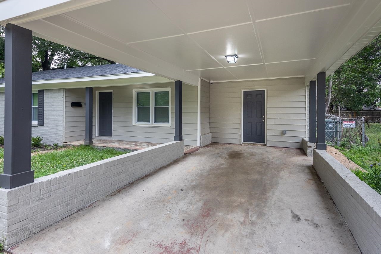 4574 Boyce Road Memphis, TN 38117 - Photo 26 of 28 a view of a house with porch and garden