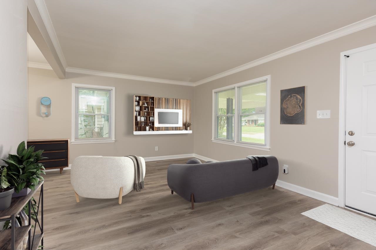 4574 Boyce Road Memphis, TN 38117 - Photo 3 of 28 a living room with furniture and a potted plant