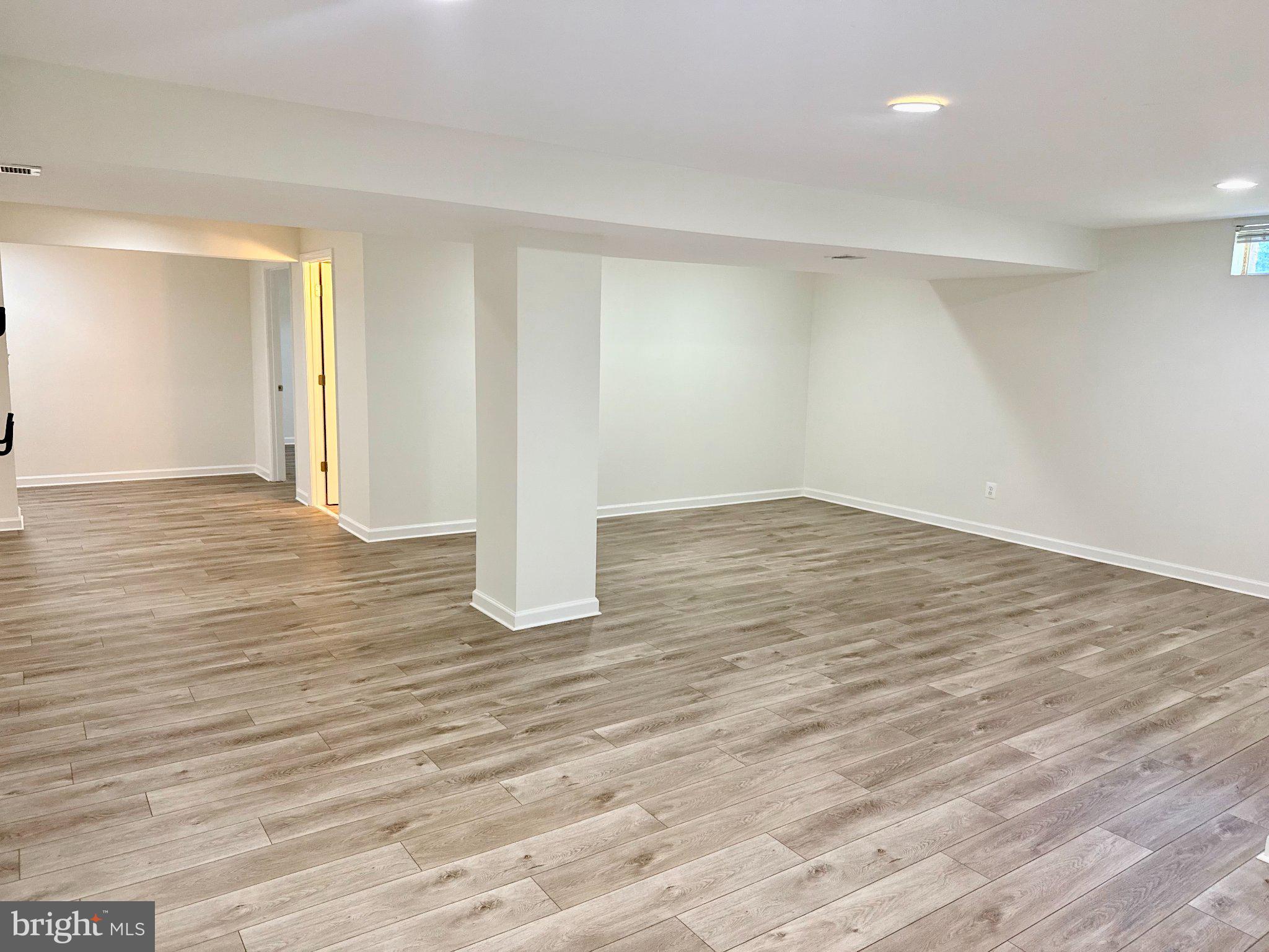 9733 Hidden Road Vienna, VA 22181 - Photo 37 of 39 Spacious, versatile basement retreat.