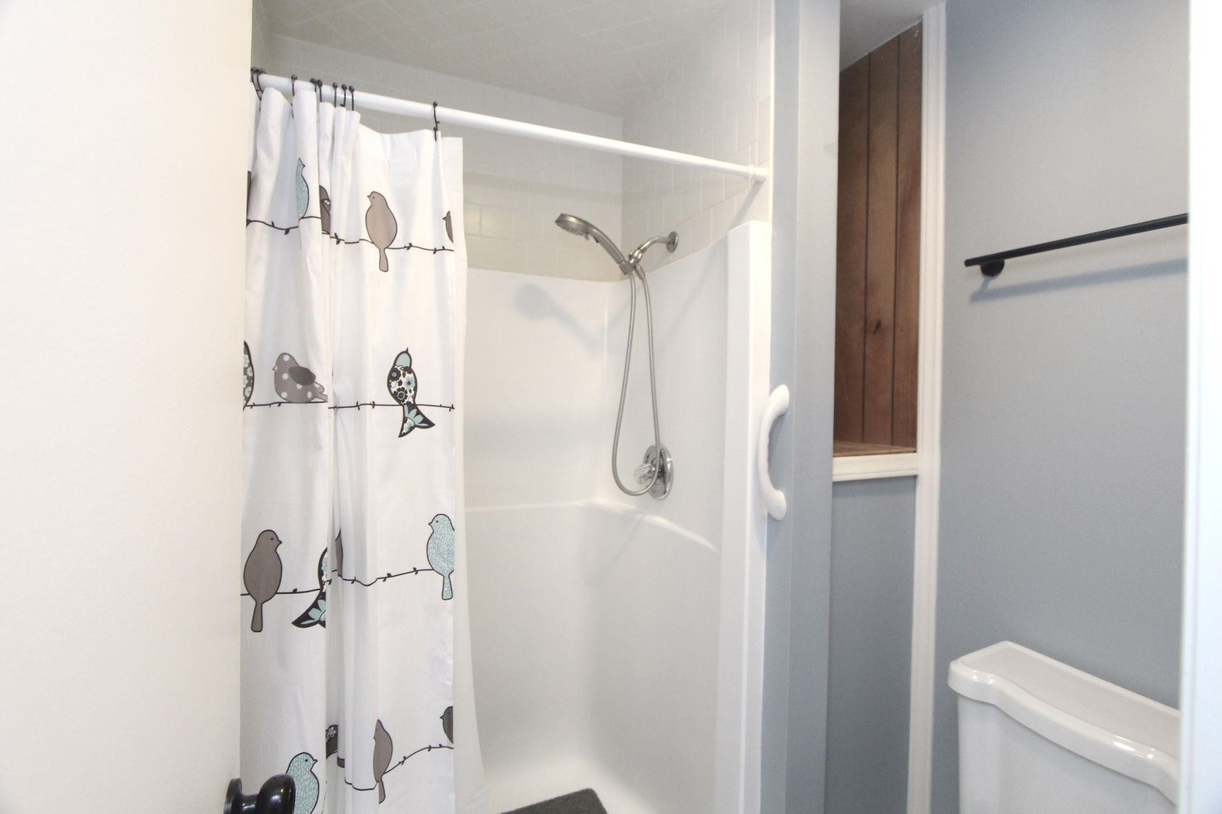 4161 Range Road Stem, NC 27581 - Photo 27 of 43 a bathroom with a shower