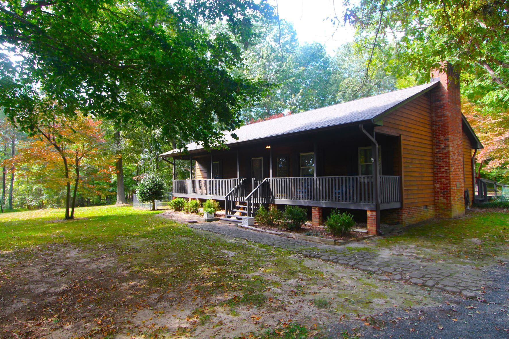 4161 Range Road Stem, NC 27581 - Photo 3 of 43 a view of a house with backyard and trees