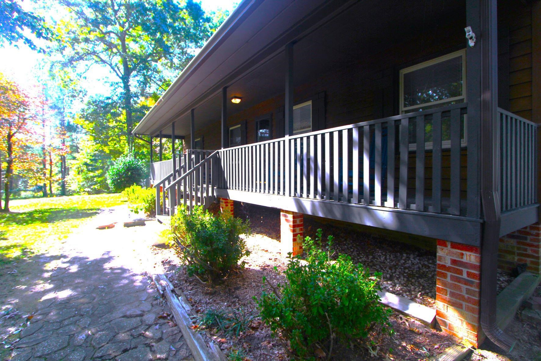 4161 Range Road Stem, NC 27581 - Photo 5 of 43 a view of a patio with a yard