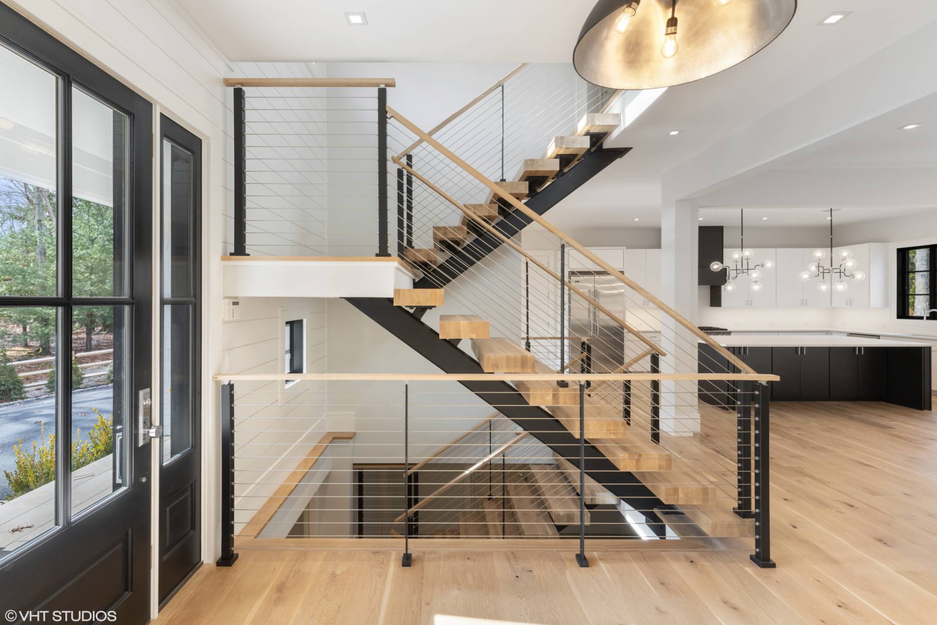 8 Crows Nest Lane East Hampton, NY 11937 - Photo 2 of 15 a view of entryway and hall with wooden floor