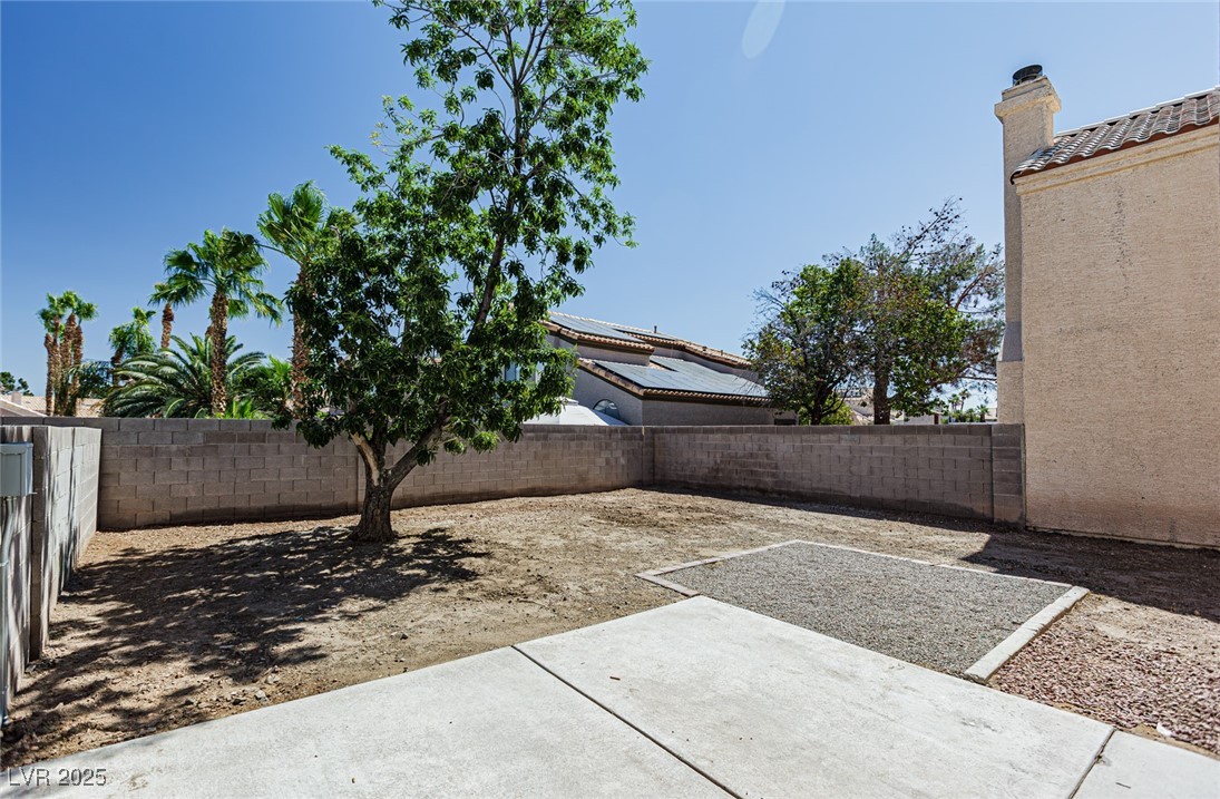 306 Lander Drive Henderson, NV 89074 - Photo 29 of 30 Fenced backyard with a patio