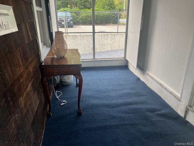 495 Community Drive Manhasset, NY 11030 - Photo 4 of 13 workspace with wooden floor and furniture