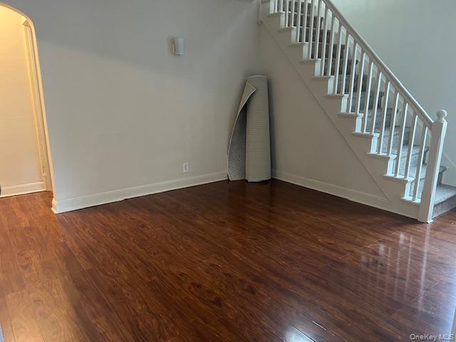 495 Community Drive Manhasset, NY 11030 - Photo 6 of 13 a view of an entryway with wooden floor