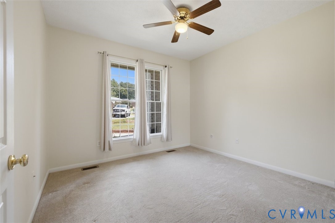 12600 Lilking Road Chester, VA 23831 - Photo 28 of 33 Bright, carpeted bedroom featuring glass French do