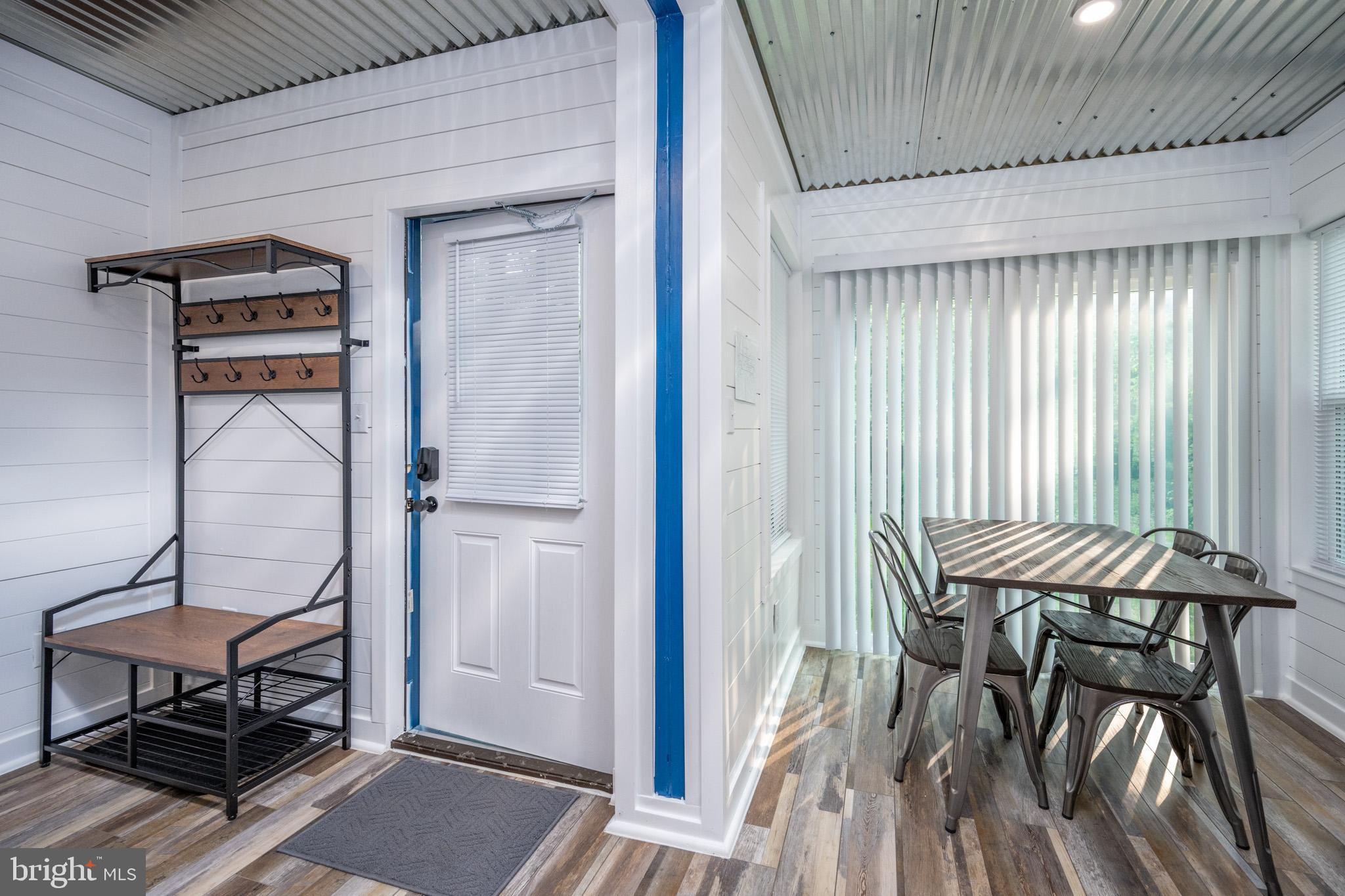 2195 Glendale Road Swanton, MD 21561 - Photo 5 of 35 a view of a dining room with furniture and window