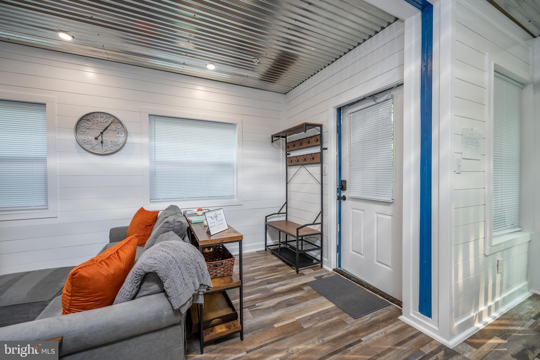 2195 Glendale Road Swanton, MD 21561 - Photo 6 of 35 a blue and white kitchen with a large window