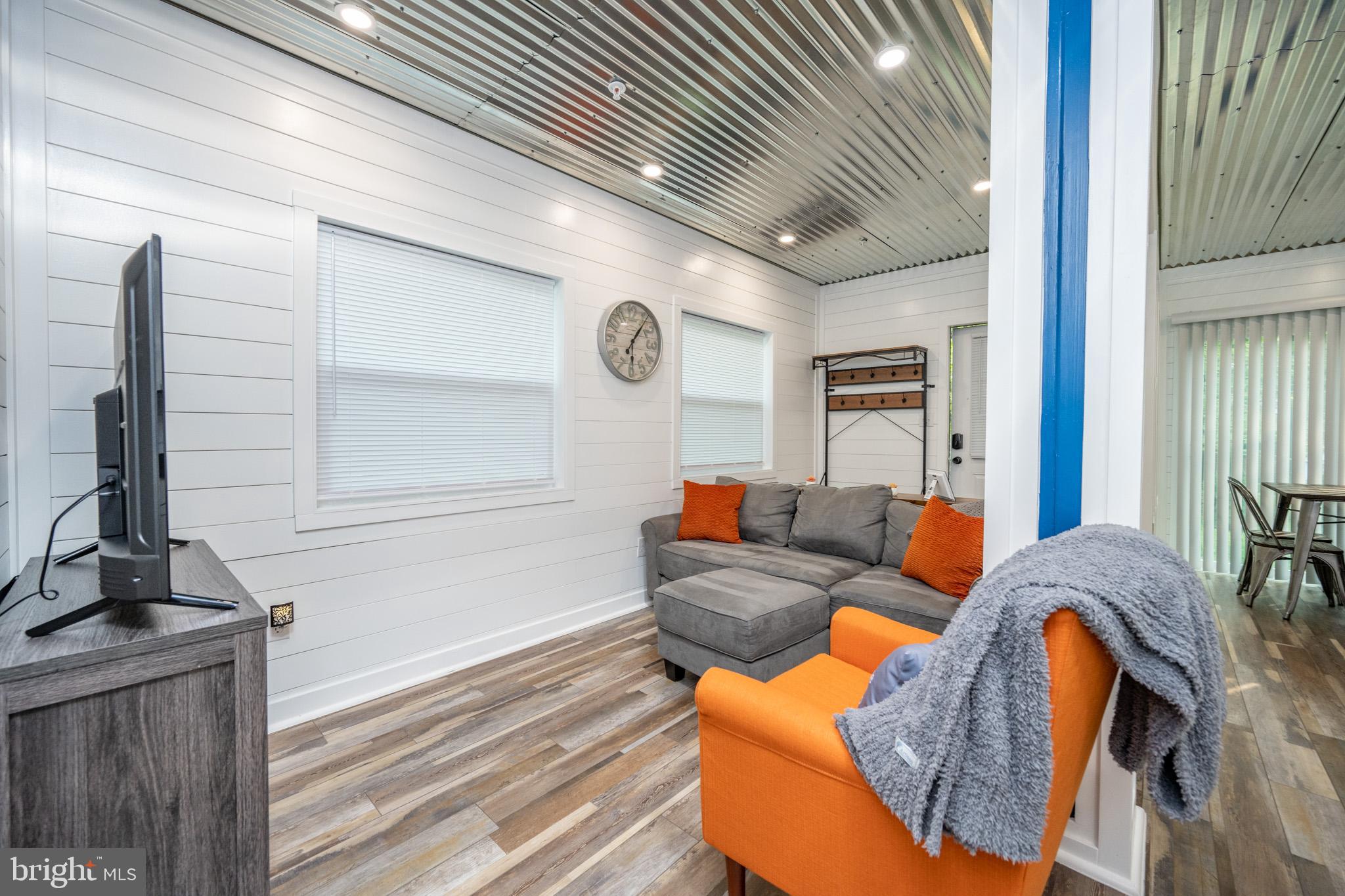 2195 Glendale Road Swanton, MD 21561 - Photo 10 of 35 a living room with furniture and a large window