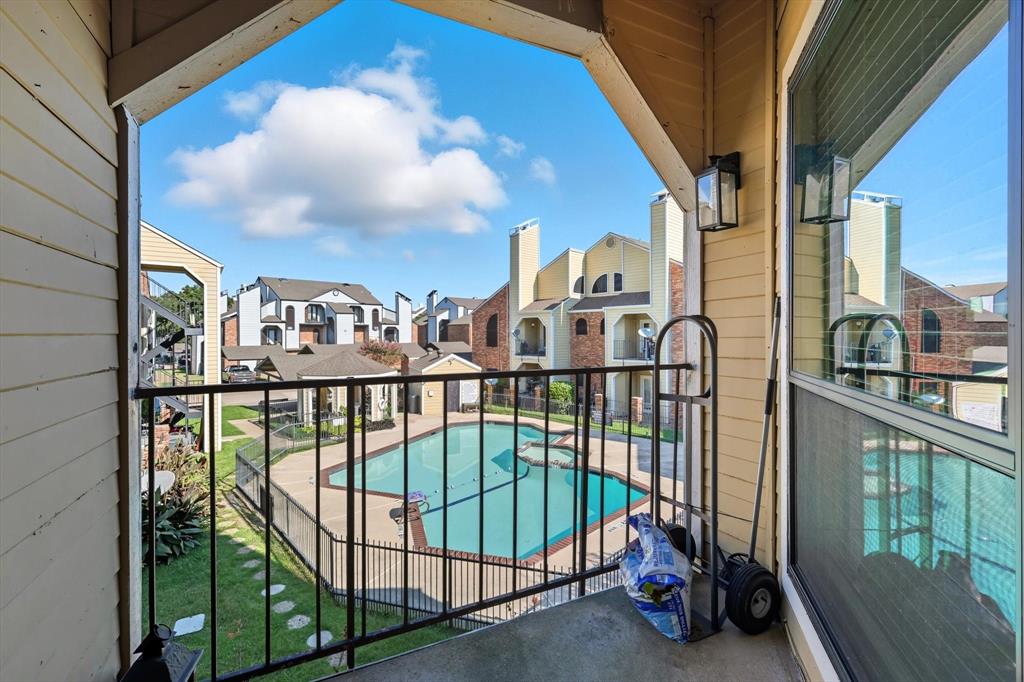 4430 Point Boulevard, Unit 203 Garland, TX 75043 - Photo 21 of 40 a view of a balcony